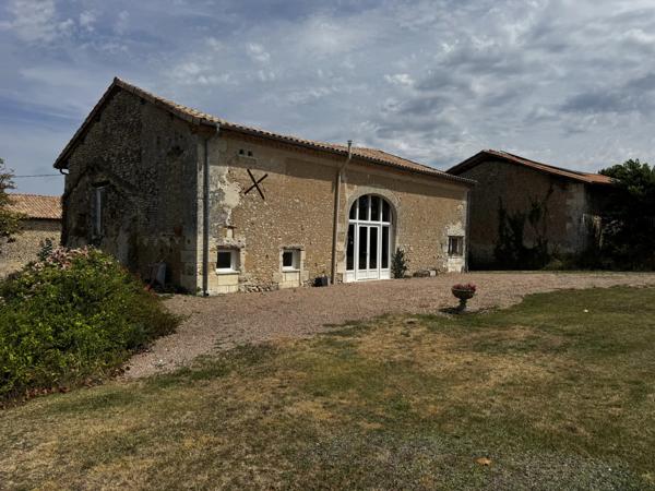 Maison de caractère de 3/4 chambres avec vue sur la campagne et potentiel de revenus