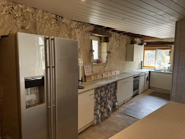 Maison de caractère de 3/4 chambres avec vue sur la campagne et potentiel de revenus