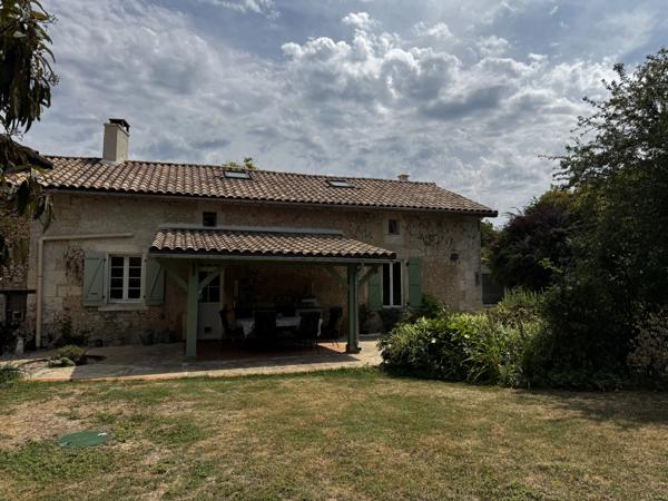 Maison de caractère de 3/4 chambres avec vue sur la campagne et potentiel de revenus