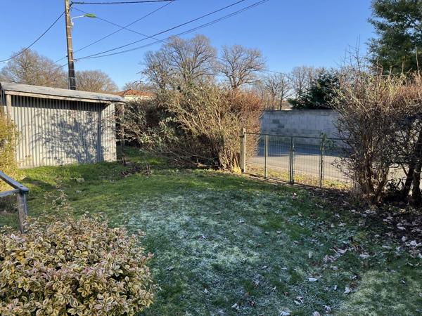 Maison de bourg de 3 chambres, garage et Jardin attenantes