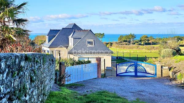 BSK immobilier, Marie-Thérèse VALLADON a le plaisir de vous présenter en Exclusivité cette Très Belle Maison d'Architecte à 3 km de PLÉNEUF-VAL-ANDRÉ, dans un environnement privilégié, cette propriété offre un cadre de vie exceptionnel.
 
À seulement quelques centaines de mètres de la plage, dans un secteur du littoral préservé où toute nouvelle construction est désormais interdite, cette propriété de haut standing, très calme, est accessible par allée privée. 
Équipée PMR, elle développe 223 m2 habitables - DPE A* - sur une parcelle paysagée entièrement close de 989 m2. Avec son doux jardin et la Vue sur la Mer, la pierre naturelle, le parquet Merbau chêne massif, la pergola, la véranda bio-climatique et les nombreuses pièces lumineuses à grands volumes, la propriété est un havre de paix.

Dès l’entrée, le hall accueillant mène vers les pièces de réceptions. 
Un vaste espace de 60 m2 composé du séjour-salon et d'une cuisine américaine de style s'ouvre, au Sud sur une pergola et à l'Ouest sur une véranda bio-climatique, par de grandes baies donnant sur le jardin.
La suite parentale spacieuse offre le confort d'une grande chambre de 17 m2 et d'une salle de bains équipée baignoire Balnéo et douche.
À ce niveau se trouve également un toilette avec lave-mains, une arrière-cuisine, un cellier-buanderie, un double garage motorisé, ainsi que des espaces supplémentaires de rangement.

À l'étage, la maison déploie son caractère unique. 
Une salle de détente d'environ 40 m2 en mezzanine, bénéficie d'une haute luminosité et d'une vue magnifique sur la mer. 
Deux chambres dont une avec dressing, une salle d'eau avec wc, et un atelier d'artiste transformable en suite parentale, salle de sport ou autres, selon les besoins des futurs propriétaires.

À l'extérieur, les aménagements paysagers ont été soigneusement réalisés tout en préservant l'intimité des lieux, pour profiter pleinement d'un jardin aux tons frais et fleuris qui invite au bord de mer.

Cette propriété sécurisée, aux options technologiques avancées, demande très peu d'entretien. 
À proximité des principaux axes de circulations, de Lamballe-Armor et de sa gare TGV reliant Paris en 2 h 15 environ, elle se trouve idéale pour une clientèle souhaitant le télétravail, une résidence secondaire, ou encore l'installation paisible pour une retraite des plus agréables au cœur d'un environnement privilégié, à proximité de toutes commodités, où l'horizon offre une palette de bleus incomparables.

À 5 mn du PORT DAHOUËT, aux pieds des petites criques de la Bretagne et du sentier GR34, non loin des plages de sable fin, de l'un des plus beaux parcours de Golf de France et des commerces accessibles rapidement, ce cadre de vie d'exception allie esprit contemporain et poésie du paysage marin Breton.

Un lieu où tout a été pensé de la lumière à l'espace, pour l'appréciation de la mer vu de chez soi.  Une maison rare, prête à accueillir une nouvelle histoire, dans l'un des secteurs les plus prisés des Côtes d’Armor.

Commune limitophe de Pléneuf-Val-André, taxe foncière: 1310€

*DPE A en attente de validation suite à l'installation de la pompe à chaleur.


Pour visiter cette belle maison prenez dès à présent votre rendez-vous. 
Marie-Thérèse VALLADON - Tel : 07 49 72 89 43 - 22800 Quintin 
Disponible du lundi au samedi de 9 h à 12 h et de 13 h 30 à 19 h.


--
