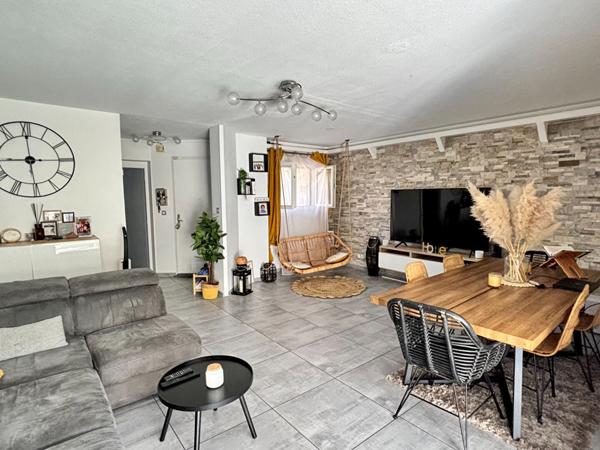 Maison de type 4 d'environ 100m² avec jardin et place de stationnement