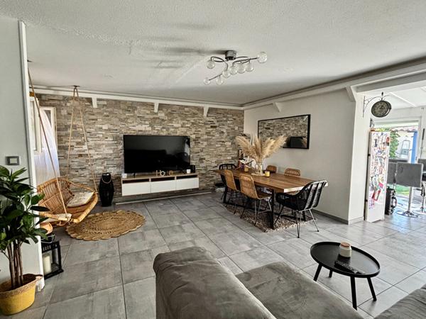 Maison de type 4 d'environ 100m² avec jardin et place de stationnement