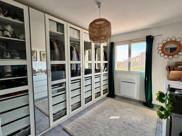 Maison de type 4 d'environ 100m² avec jardin et place de stationnement