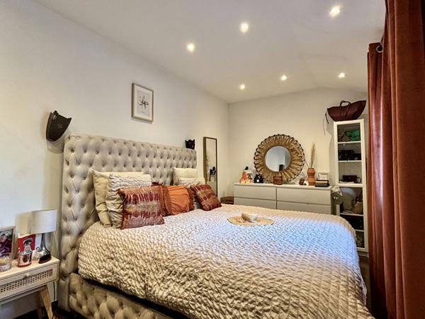 Maison de type 4 d'environ 100m² avec jardin et place de stationnement