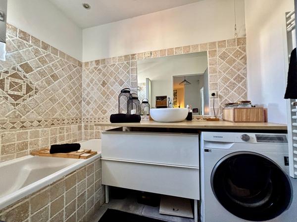 Maison de type 4 d'environ 100m² avec jardin et place de stationnement