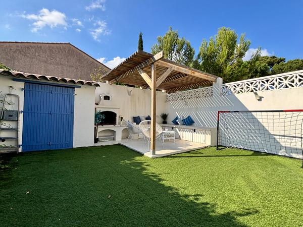 Maison de type 4 d'environ 100m² avec jardin et place de stationnement