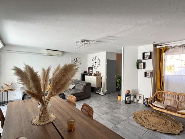 Maison de type 4 d'environ 100m² avec jardin et place de stationnement