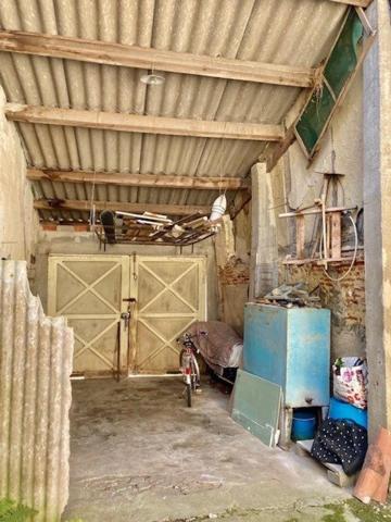 MAISON DE VILLE AVEC JARDIN ET DEPENDANCES