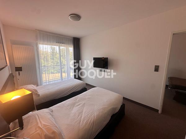 Investissement locatif sécurisé T2 de 50m2 meublé avec terrasse et services 4 étoiles