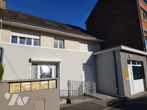 Immeuble de rapport de 4 logements et d'un local professionnel situé en centre ville.