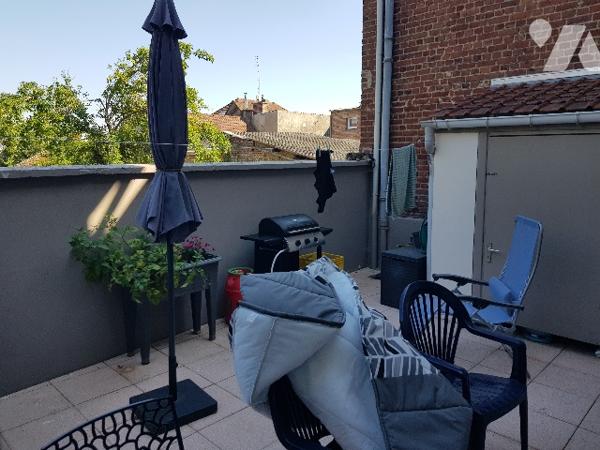 Immeuble de rapport de 4 logements et d'un local professionnel situé en centre ville.