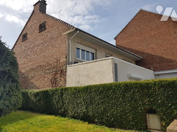 Immeuble de rapport de 4 logements et d'un local professionnel situé en centre ville.