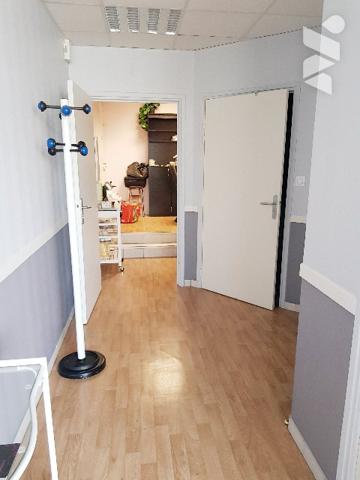 Immeuble de rapport de 4 logements et d'un local professionnel situé en centre ville.