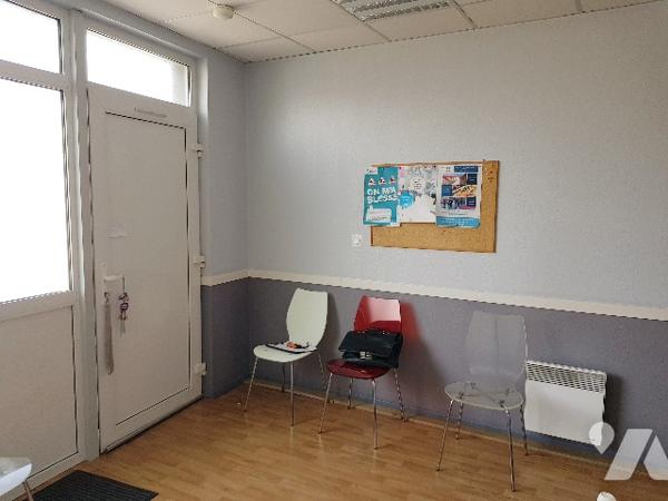 Immeuble de rapport de 4 logements et d'un local professionnel situé en centre ville.