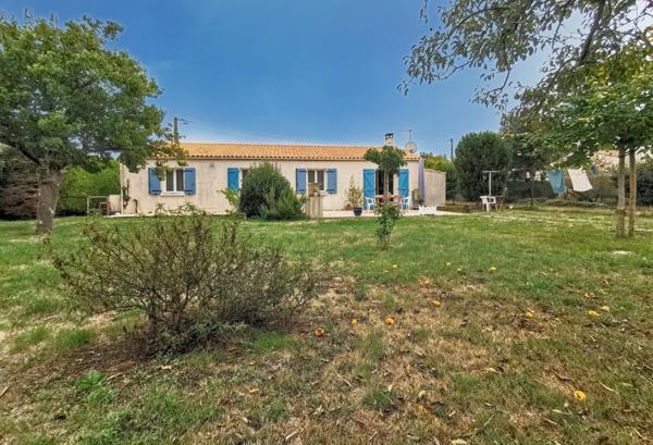 Plain-pied 3 ch et garage sur terrain 1000 m²