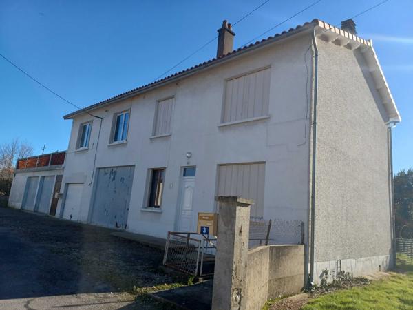 IMMEUBLE AVEC RAPPORT LOCATIF + 4 GARAGES