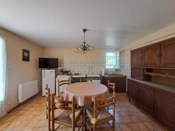 Maison familiale avec logement indépendant et terrain arboré