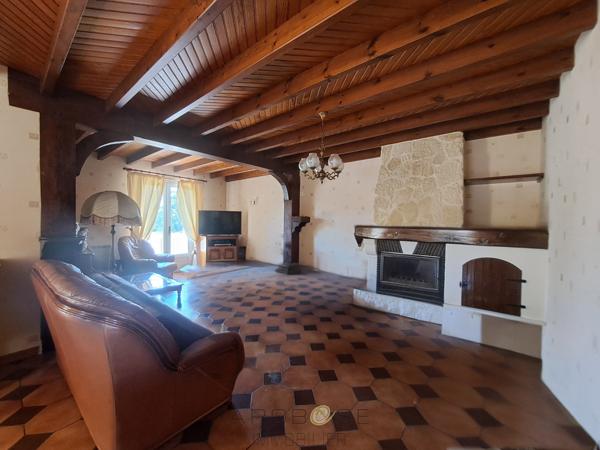 Maison familiale avec logement indépendant et terrain arboré