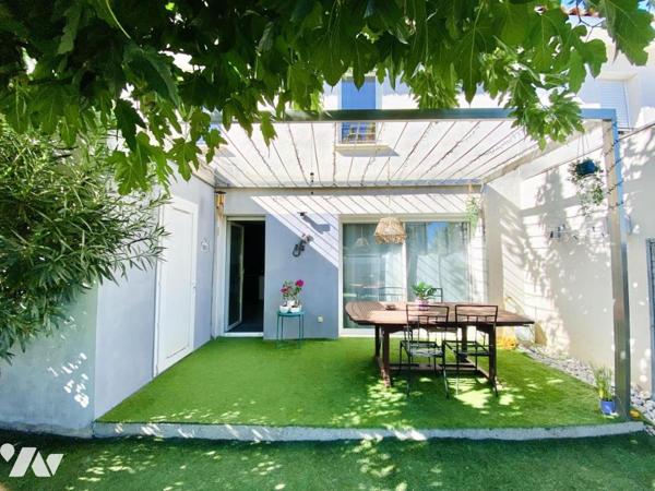 Maison de T4 avec jardin et place de stationnement privatives