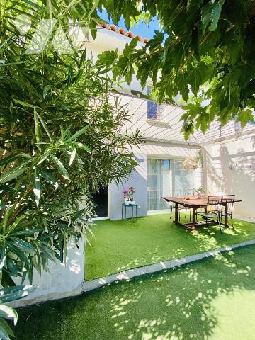 Maison de T4 avec jardin et place de stationnement privatives