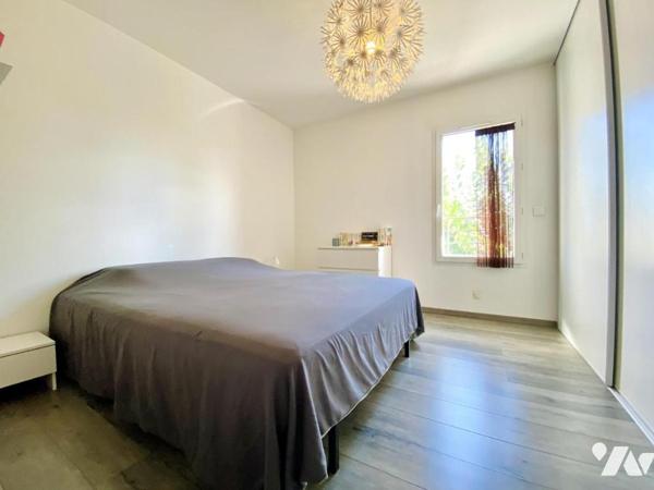 Maison de T4 avec jardin et place de stationnement privatives