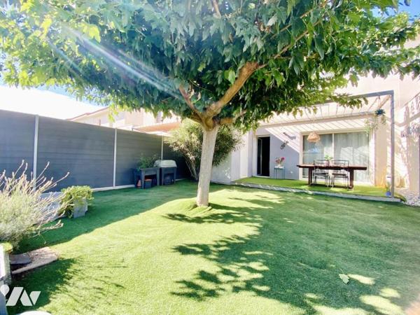 Maison de T4 avec jardin et place de stationnement privatives