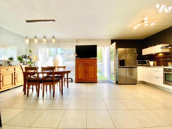 Maison de T4 avec jardin et place de stationnement privatives