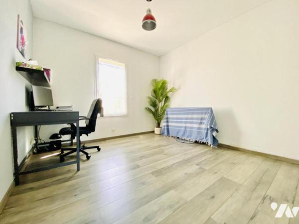 Maison de T4 avec jardin et place de stationnement privatives