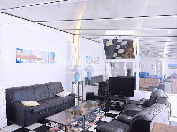 Spacieux appartement 8 pièces de 149.05 m2 (165 m² hab) avec terrasse jardin à flan de falaise à Fleury d'Aude Saint-Pierre-La-Mer