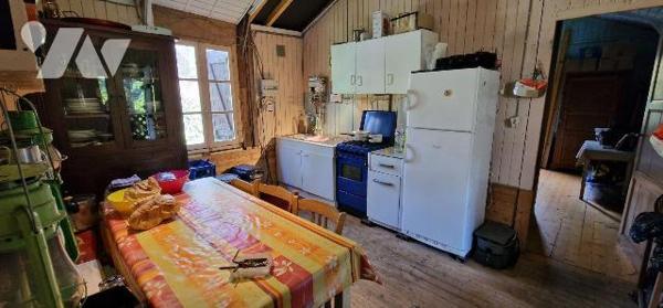Terrain de loisirs avec chalet de 42 m² à vendre à Thouars (79100), avec ponton, remise et puits.