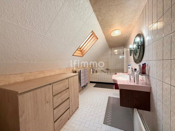 Maison familiale avec grand terrain constructible