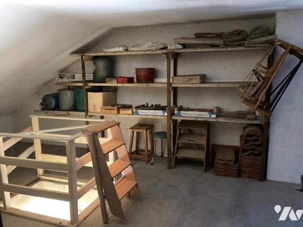 Maison 4 pièces de plain-pied (environ 128 m² habitables) située dans un secteur calme