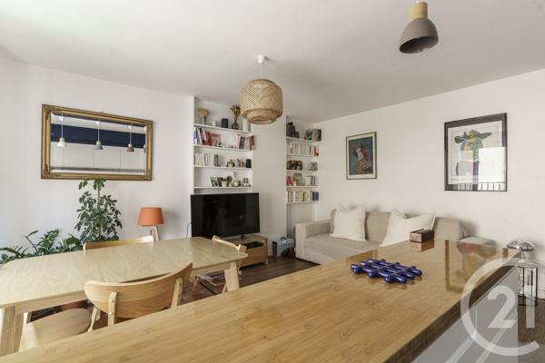 Appartement à vendre  3 pièces - 58 m 2   PARIS  - 75019