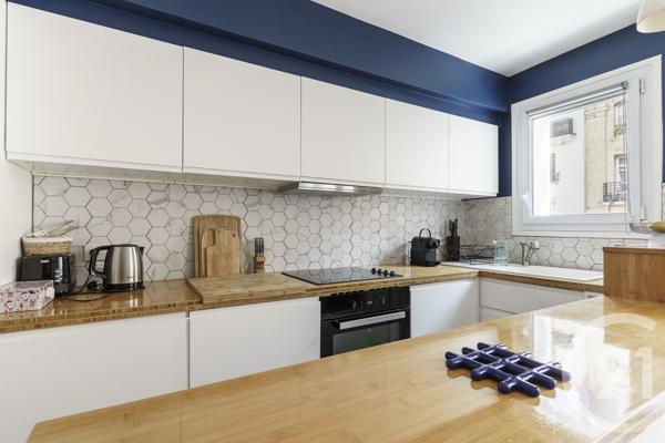Appartement à vendre  3 pièces - 58 m 2   PARIS  - 75019