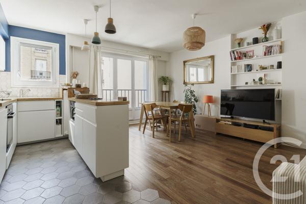 Appartement à vendre  3 pièces - 58 m 2   PARIS  - 75019