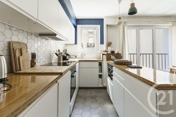 Appartement à vendre  3 pièces - 58 m 2   PARIS  - 75019