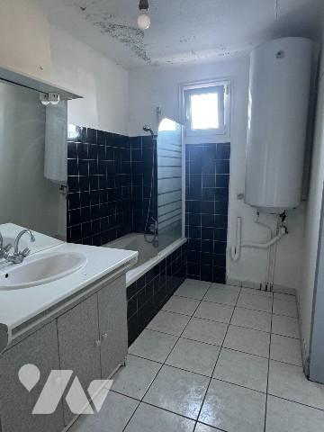 Appartement de type 3 en rez-de-chaussée