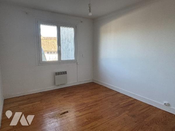 Appartement de type 3 en rez-de-chaussée