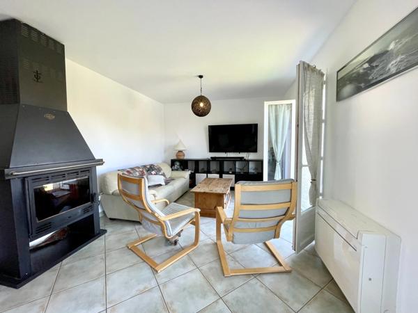 Maison familiale 128 m² avec double garage et jardin à Saint-Laurent-d'Aigouze