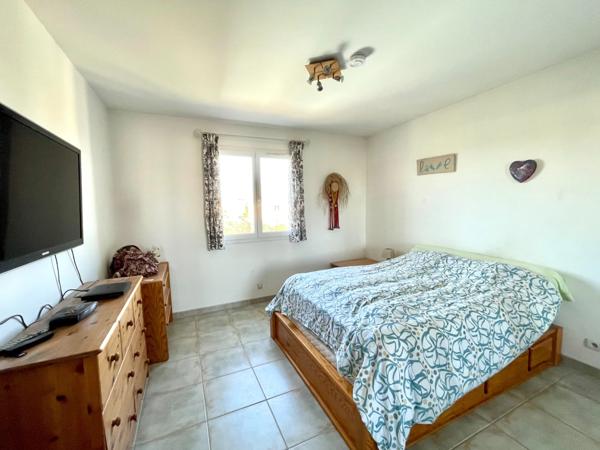 Maison familiale 128 m² avec double garage et jardin à Saint-Laurent-d'Aigouze