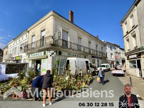 Immeuble mixte habitation commerce en centre ville