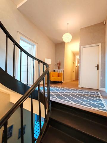 Demeure Haussmannienne et son parc paysager, en coeur de ville