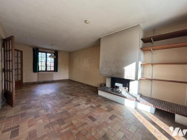 Maison d'habitation avec sous-sol et jardin