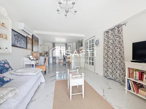 Maison 4 faces de 122 m² habitables avec garage et annexes