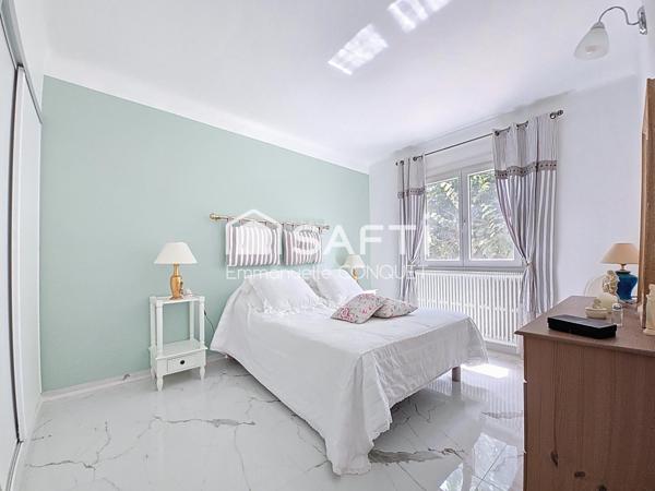 Maison 4 faces de 122 m² habitables avec garage et annexes