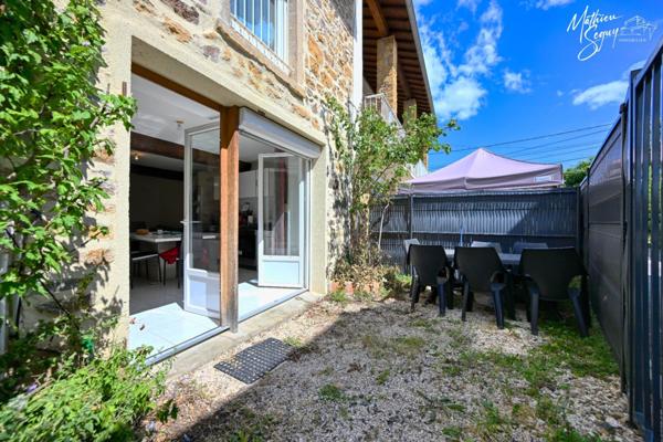 Appartement à louer 2 pièces avec jardin et 2 stationnements BULLY (69)