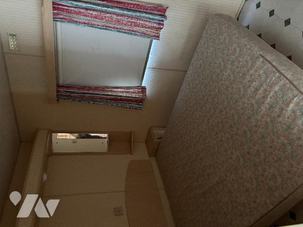 Un parc entièrement clôturé  d’une surface totale de 5 ha 53 a 75 ca avec un mobil-homes.