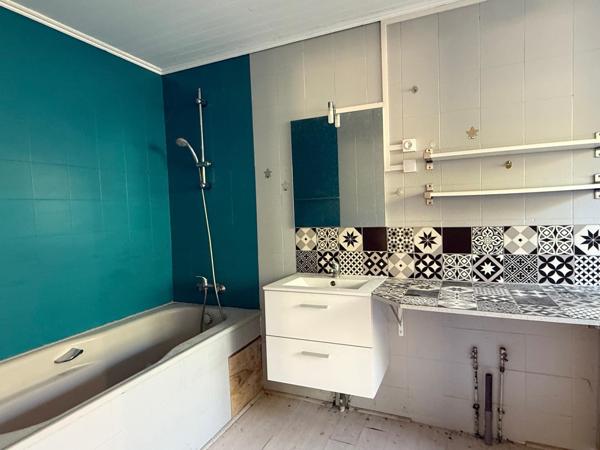 Maison mitoyenne 95 m² à agencer