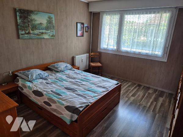 Appartement T4 au demi RDC avec grand balcon exposé Sud/Est